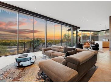 Stunning living room with panoramic views and modern furniture at 4796 E Charles Dr, Paradise Valley, AZ 85253
