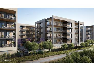 Modern apartment building with several stories and balconies at 19355 N 73Rd Way # 2021, Scottsdale, AZ 85255