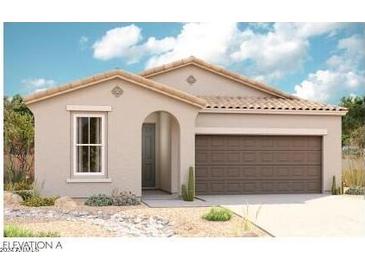 New construction home with a two-car garage and desert landscaping at 18493 E Camila Dr, Gold Canyon, AZ 85118