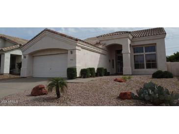 House exterior with desert landscaping at 6547 E Sierra Morena St, Mesa, AZ 85215