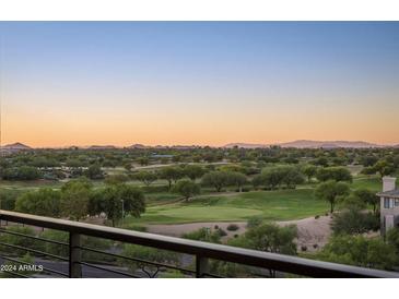 Stunning aerial view overlooking a lush golf course and mountain landscape at 15215 N Kierland Blvd # 436, Scottsdale, AZ 85254