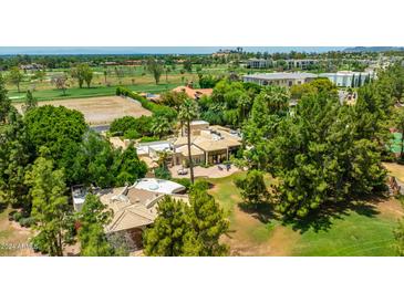 Luxury estate home with expansive grounds and golf course views at 94 Biltmore Est, Phoenix, AZ 85016