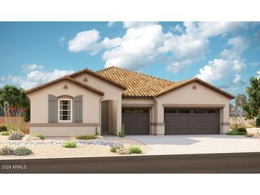 Two-story home with tile roof and two-car garage at 20262 W Hollyhock St, Buckeye, AZ 85396