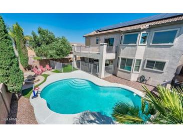 Luxury two-story home with a private pool and expansive backyard at 17473 W Elizabeth Ave, Goodyear, AZ 85338