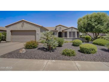 One story home with landscaped yard at 17780 W Canto Bonito Ln, Surprise, AZ 85387