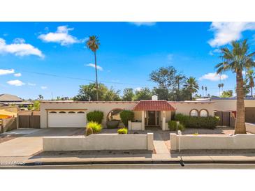 Single story home with a charming exterior at 7012 N 22Nd St, Phoenix, AZ 85020