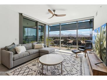 Modern living room with city views and comfortable seating at 7180 E Kierland Blvd # 509, Scottsdale, AZ 85254