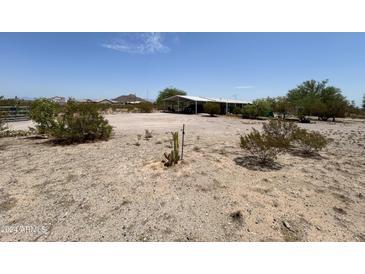 Aerial view of a desert property with a mobile home at 2249 W Daniel Rd, San Tan Valley, AZ 85144
