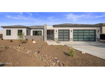 Modern home exterior with two car garage at 19617 N 39Th Dr, Glendale, AZ 85308