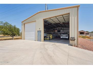 Spacious workshop with ample room for vehicles and storage at 23040 W Hammond Ln, Buckeye, AZ 85326