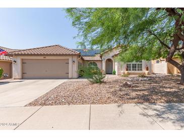 House exterior with a two-car garage and landscaping at 4536 E Via Dona Rd, Cave Creek, AZ 85331
