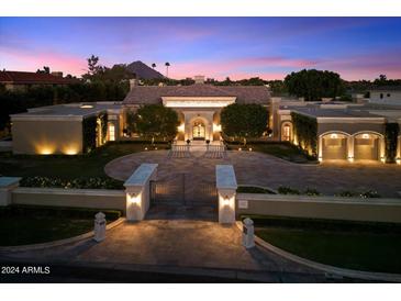 Luxury estate home with circular driveway and gated entry at 40 Biltmore Est, Phoenix, AZ 85016