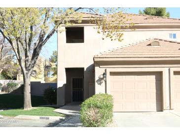 Two-story condo building with attached garage at 7401 W Arrowhead Clubhouse Dr # 2072, Glendale, AZ 85308