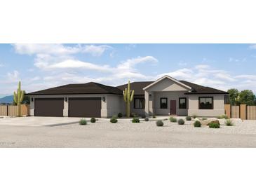 New construction home with two-car garage and desert landscaping at 1896 E Cloud Rd, Phoenix, AZ 85086