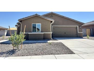 Modern one story home with a two car garage at 627 W Crowned Dove Trl, Casa Grande, AZ 85122