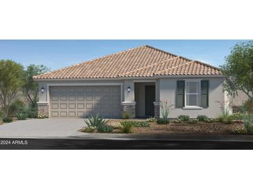 One-story home with tile roof, neutral exterior, and landscaping at 17614 W Oberlin Way, Surprise, AZ 85387