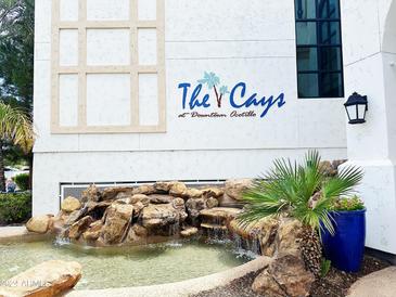 Exterior of The Cays at Downtown Ocotillo building with fountain at 2511 W Queen Creek Rd # 417, Chandler, AZ 85248