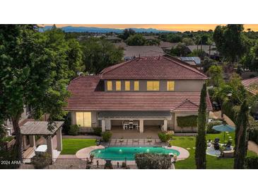 Two-story home with backyard pool and mountain views at 6574 S Crestview Dr, Gilbert, AZ 85298