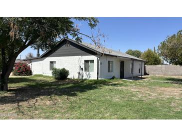 Charming single story home with landscaped lawn at 122 N Sunaire --, Mesa, AZ 85205