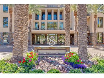 Eight Biltmore Estates building entrance with landscaping at 8 E Biltmore Est # 109, Phoenix, AZ 85016