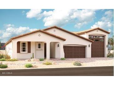 Single-story home with brown garage doors and desert landscaping at 19583 E Estrella Rd, Queen Creek, AZ 85142