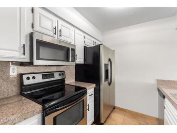 Kitchen features stainless steel appliances at 7625 E Camelback Rd # A418, Scottsdale, AZ 85251