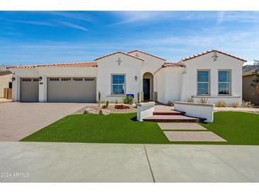 Beautiful two-story home with two car garage and artificial turf at 19980 E El Nido Ln, Litchfield Park, AZ 85340
