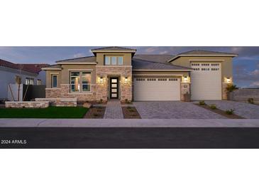 Beautiful two-story home with a three-car garage at 19974 E El Nido Ln, Litchfield Park, AZ 85340