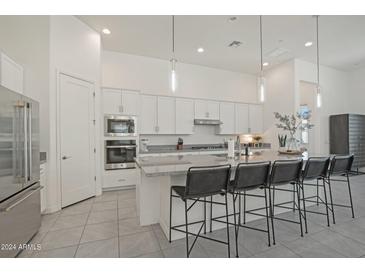 Modern kitchen with stainless steel appliances and white shaker cabinets at 38500 N School House Rd # 5, Cave Creek, AZ 85331