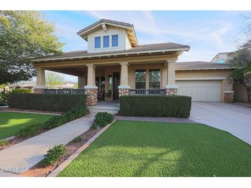 House exterior with a covered front porch and landscaping at 20377 W Terrace Ln, Buckeye, AZ 85396