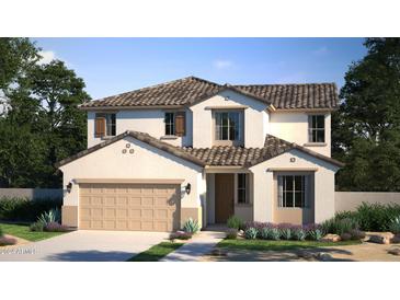 Two-story home with a two-car garage and desert landscaping at 27025 N 167Th Dr, Surprise, AZ 85387