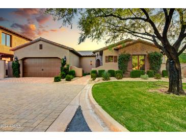 Two-story home with brick facade and landscaped yard at 3248 S Golden Barrel Ct, Gold Canyon, AZ 85118