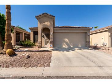 Tan house with a single-car garage at 3122 E Windmere Dr, Phoenix, AZ 85048