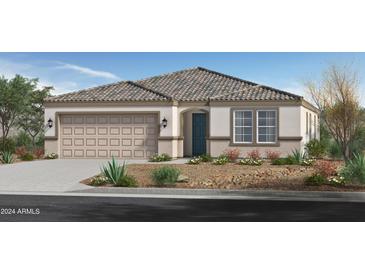 Single-story home with a two-car garage and desert landscaping at 5910 S 246Th Ln, Buckeye, AZ 85326