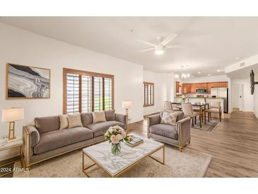 Open living room with hardwood floors and modern furniture at 5450 E Deer Valley Dr # 2206, Phoenix, AZ 85054