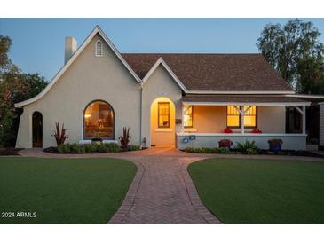 Charming craftsman home with front porch and brick pathway at 1547 W Vernon Ave, Phoenix, AZ 85007