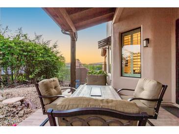 Relaxing patio with seating area and mountain views at 6069 E Knolls S Way, Cave Creek, AZ 85331