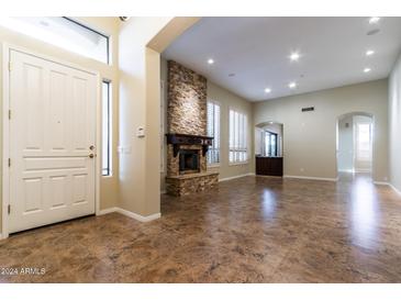 Inviting entryway with tile floors and views to the living room at 8100 E Camelback Rd # 178, Scottsdale, AZ 85251