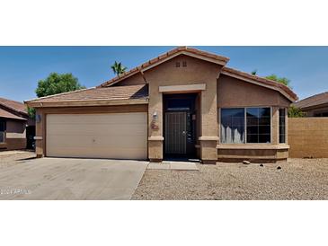 Charming single story home with attached two car garage at 8758 E Obispo Ave, Mesa, AZ 85212