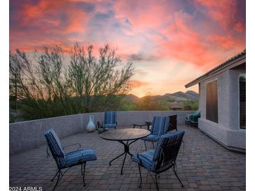 Spacious patio with mountain views and seating area at 5960 E Grapevine Rd, Cave Creek, AZ 85331