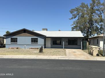 Charming single story home with a well-manicured yard at 4908 W Ocotillo Rd, Glendale, AZ 85301