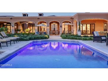 Luxury estate with inviting pool, expansive patio, and stunning architectural details at 11179 E Honda Bow Rd, Scottsdale, AZ 85262