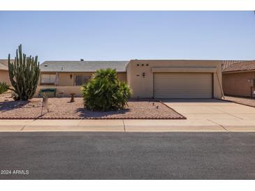 Single-story home with desert landscaping at 1729 Leisure World --, Mesa, AZ 85206