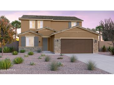 Two-story house with brown exterior, stone accents, and a two-car garage at 10130 S Bickwell Trl, Apache Junction, AZ 85120