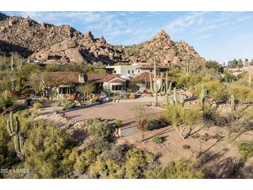 Luxury home with mountain views and a large driveway at 6616 E El Sendero Rd, Carefree, AZ 85377