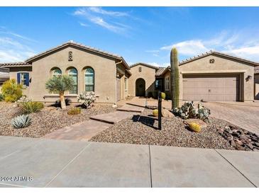 A beautiful two-story home with desert landscaping at 2072 E Blackhawk Ct, Gilbert, AZ 85298