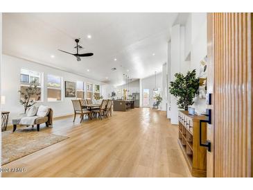 Bright and spacious living area with hardwood floors and open floor plan at 13789 E Geronimo Rd, Scottsdale, AZ 85259