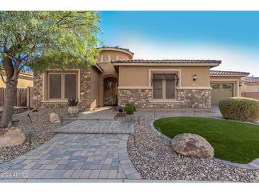 House exterior with stone accents and paver walkway at 2299 E Saddlebrook Rd, Gilbert, AZ 85298