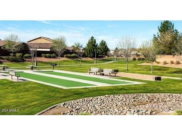 Community park with bocce ball courts, benches, and picnic areas at 901 W Witt Ave, Queen Creek, AZ 85140