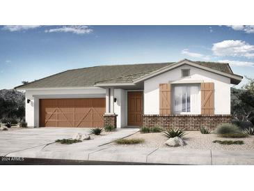 Modern home exterior with a brown door and garage at 14808 W Soft Wind Cir, Surprise, AZ 85387
